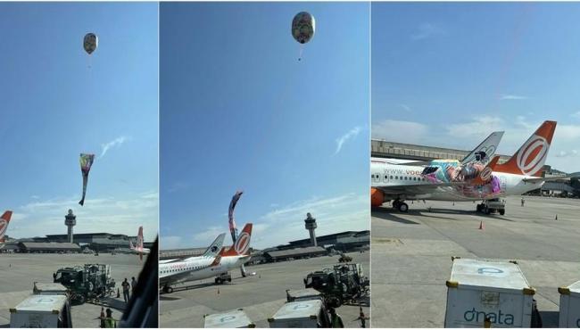 Balão cai em aeroporto e parte dele fica em cima de avião da Gol em Guarulhos, SP
