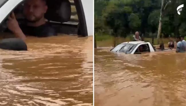 Carro fica debaixo d'água após chuvas em Governador Lindenberg no ES